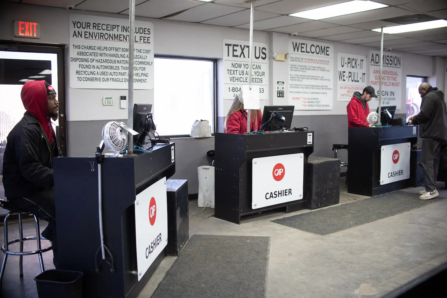 Employees at cashiers desks